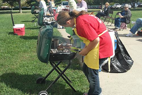 A person competes in the BBQ contest