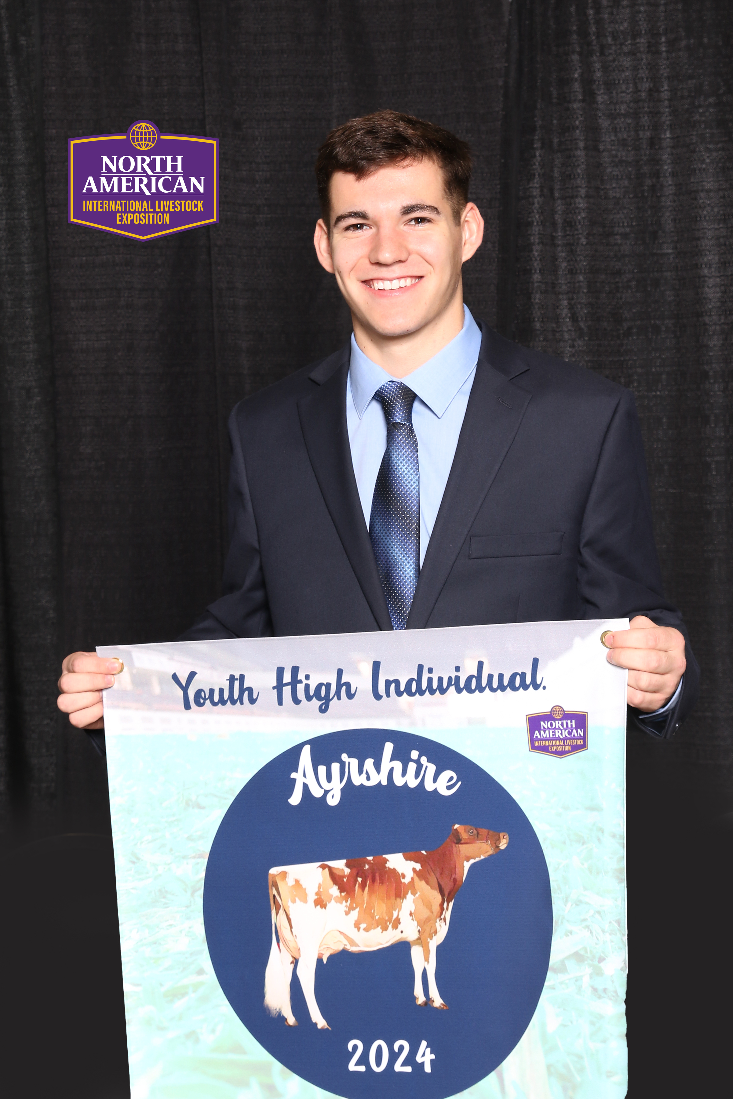 Boy holding banner