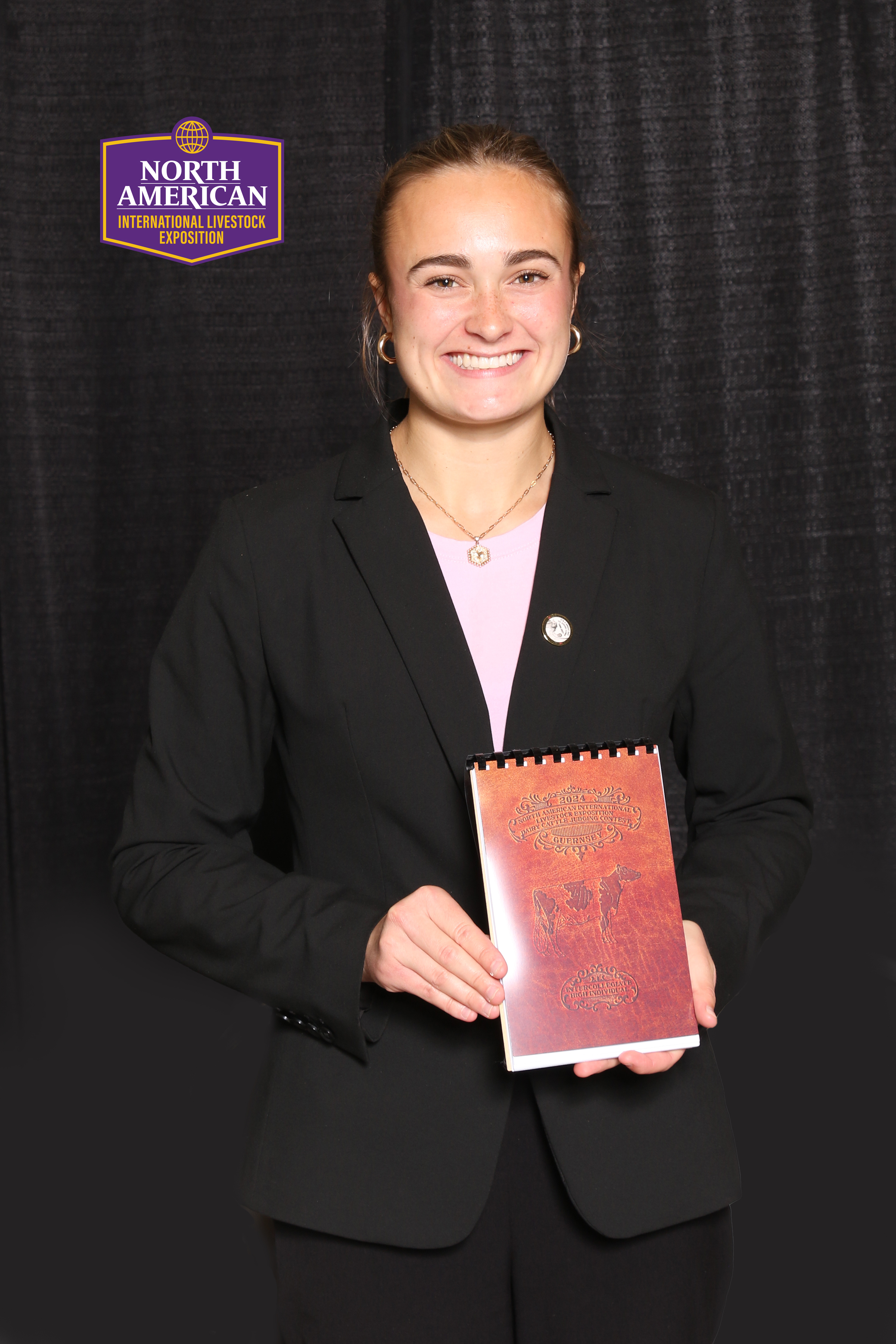 Girl holding notebook