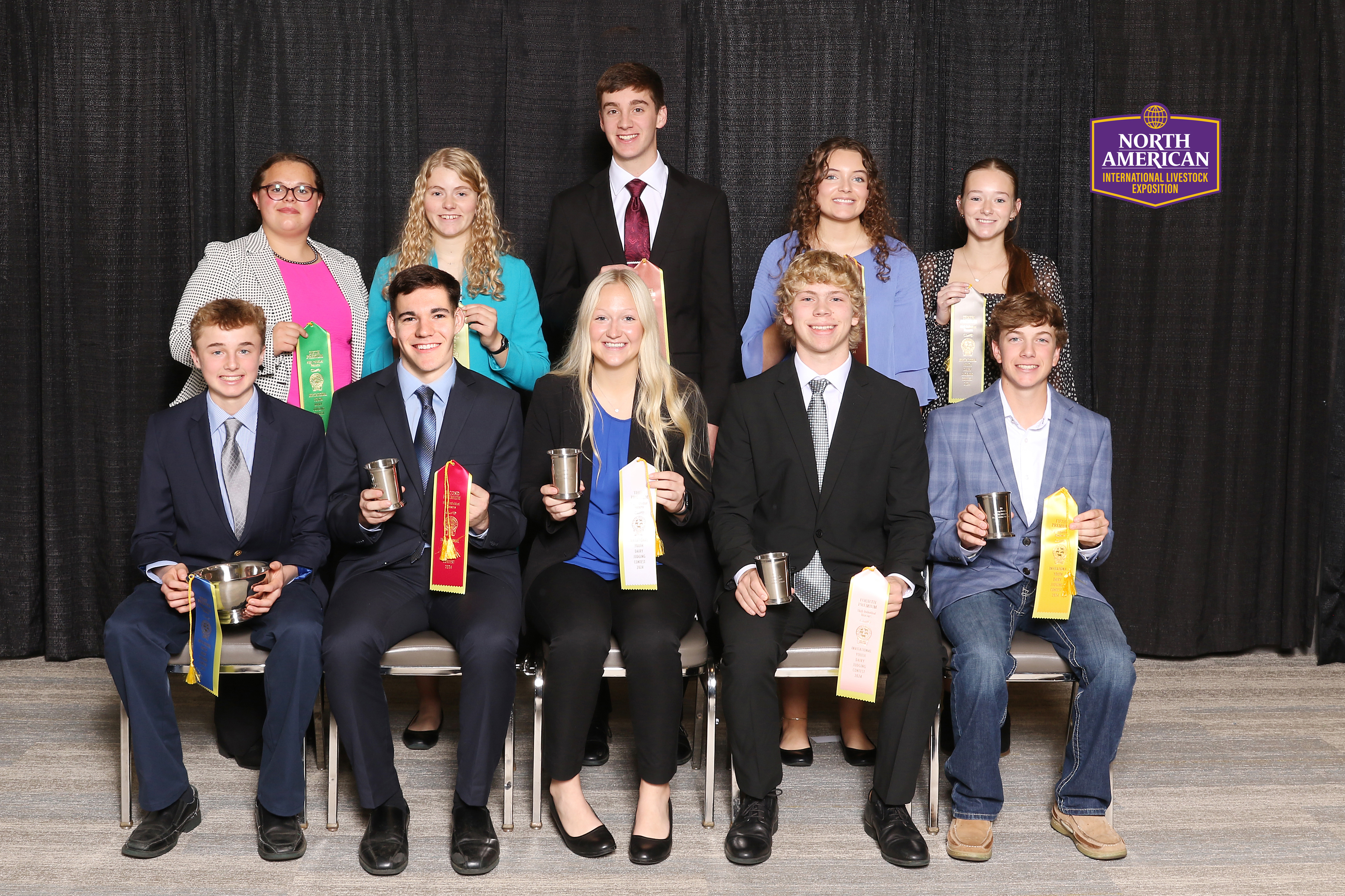 Teenagers holding ribbons