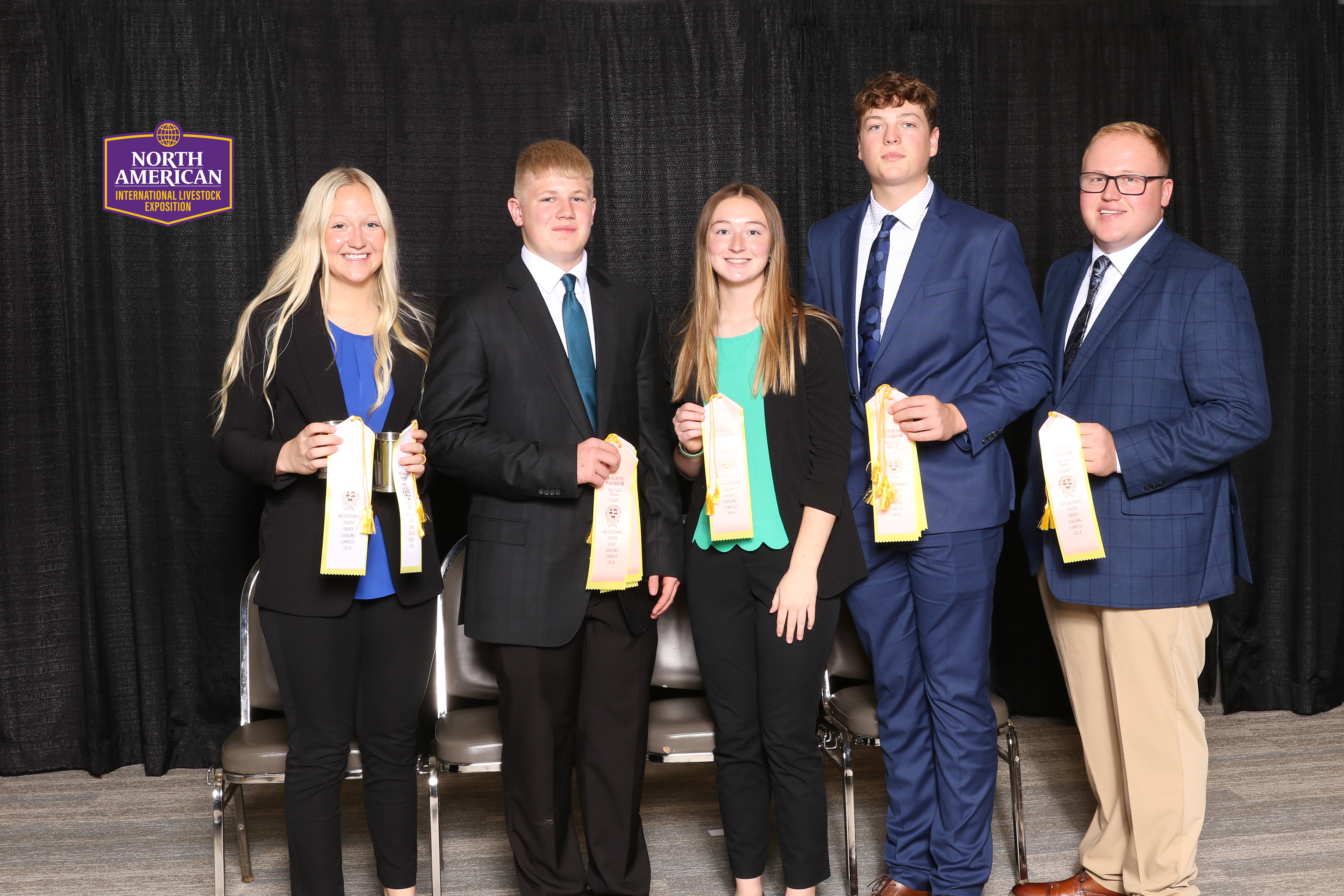 Teenagers holding ribbons