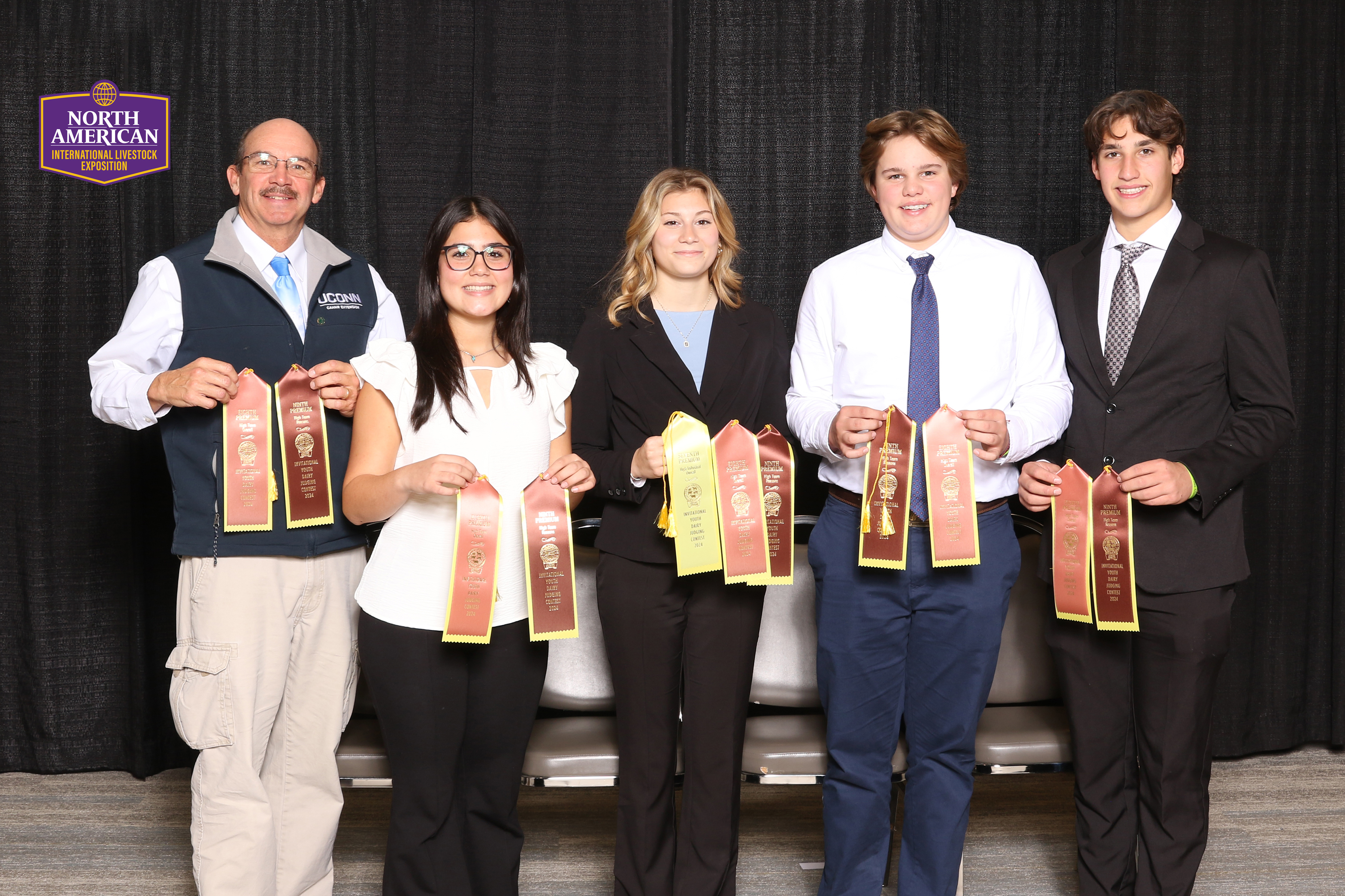 Teenagers holding ribbons